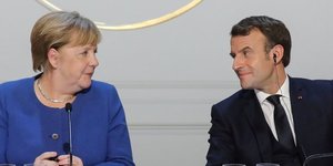 Angela Merkel et Emmanuel Macron donnent une conférence de presse après une réunion à l'Élysée, le 9 décembre 2019 à Paris