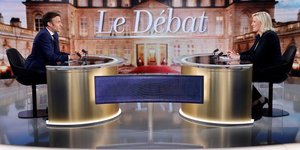 France 2022: apres le debat, le pen et macron de retour sur le terrain