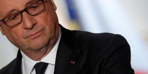 Hollande "convaincu" du caractere terroriste de la fusillade de paris